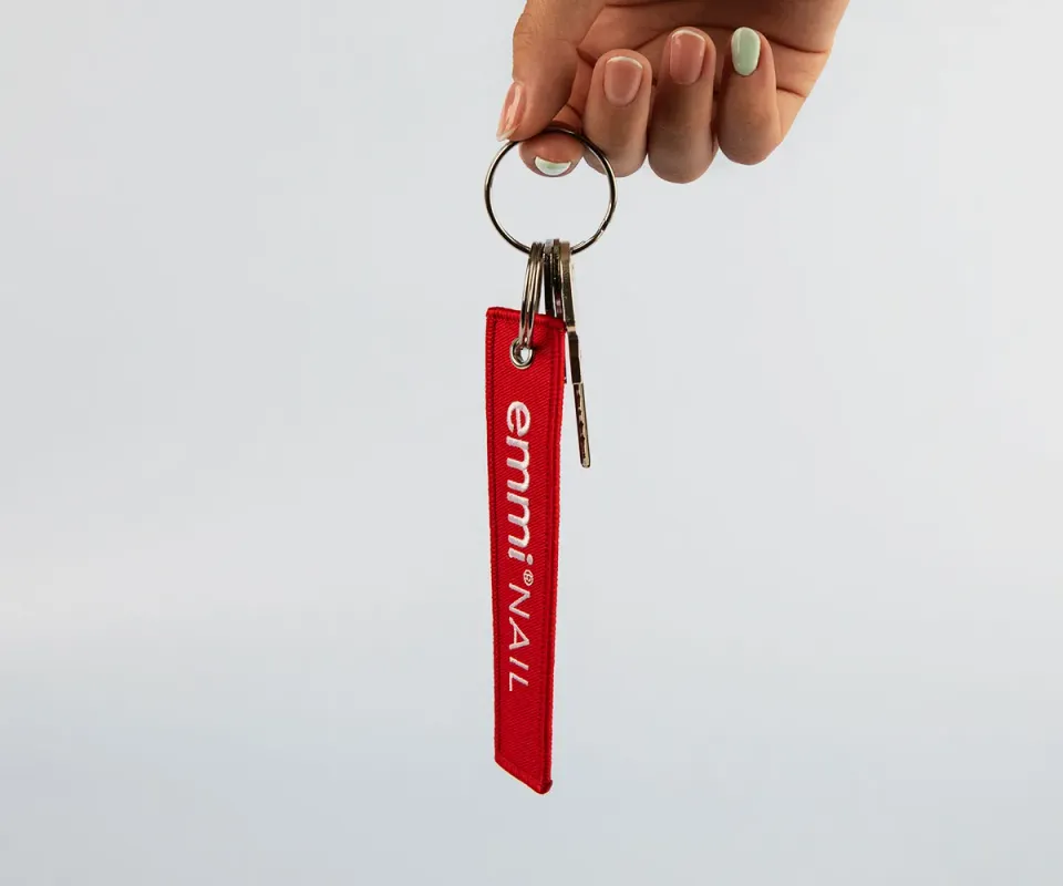 Emmi-Nail Schlüsselanhänger kurz nøglering 13 x 3 cm reklamegave