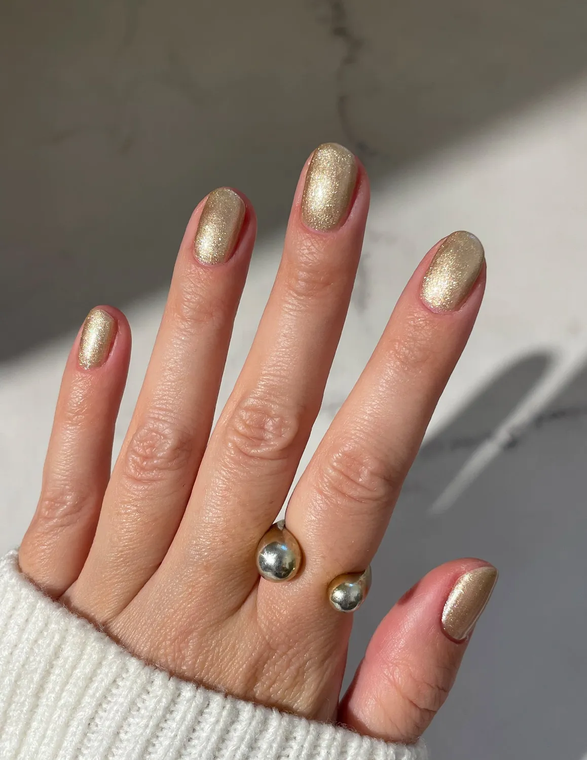 Le Mini Macaron Golden Elixir gellak 8,5 ml guld shimmer